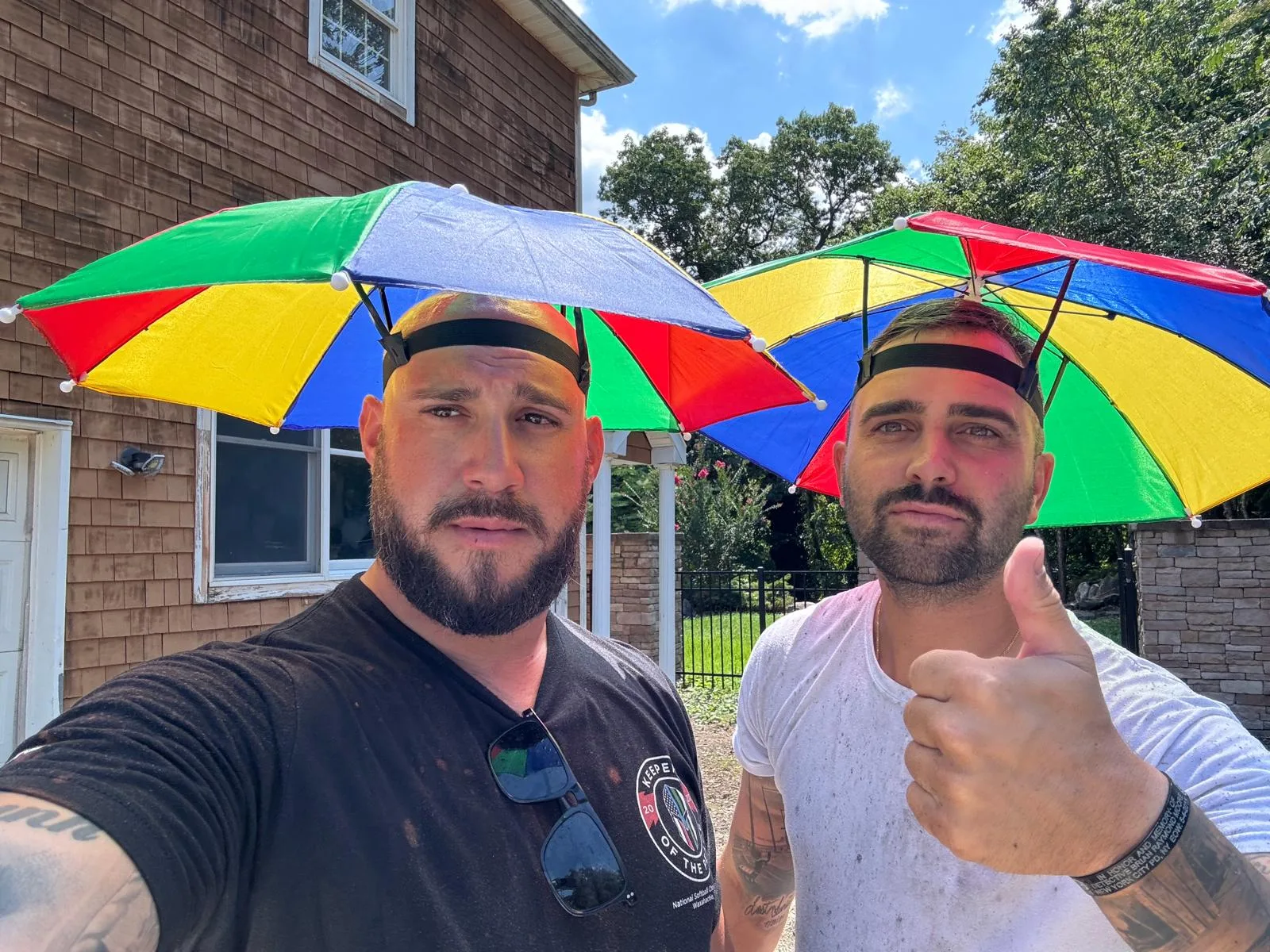 Founders of Jas Power Washing standing together proudly